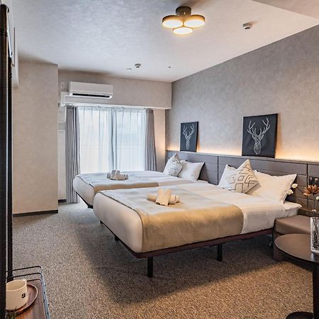 Apartment Hotel 11 Shinsaibashi 2 Osaka Bagian luar foto