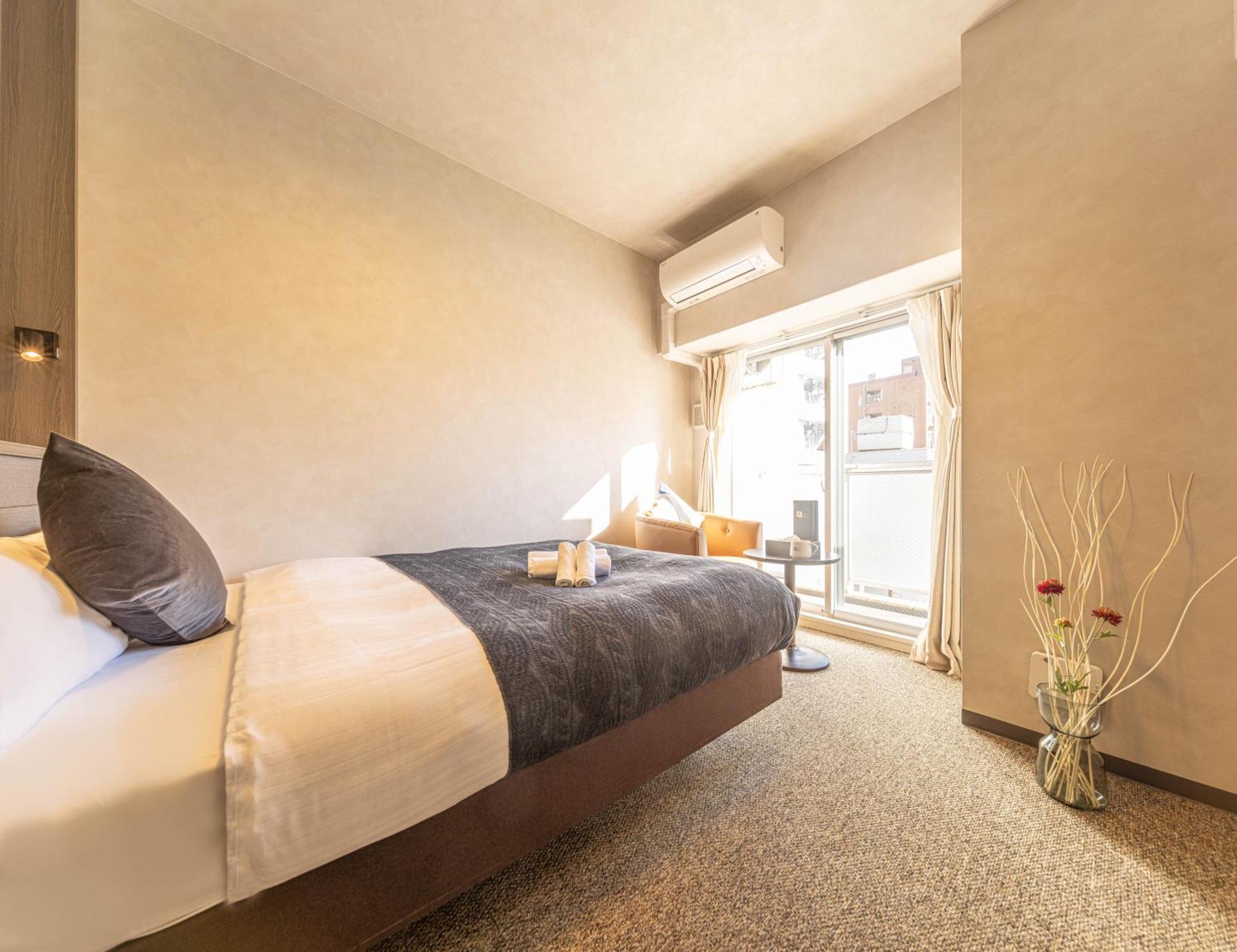 Apartment Hotel 11 Shinsaibashi 2 Osaka Bagian luar foto